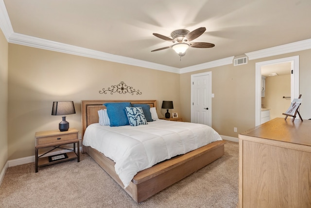 carpeted bedroom featuring ensuite bath, ceiling fan, and ornamental molding