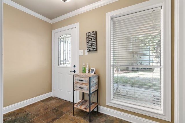 entryway featuring crown molding