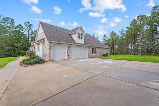 view of property exterior featuring a lawn and a garage