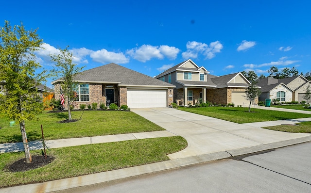 view of front of home featuring a front yard and a garage