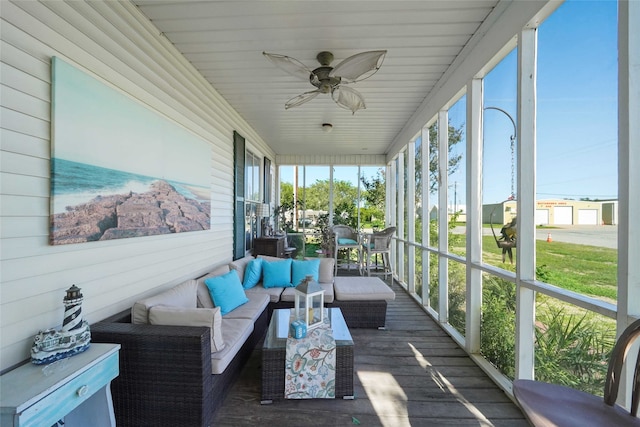 sunroom / solarium with ceiling fan and a wealth of natural light