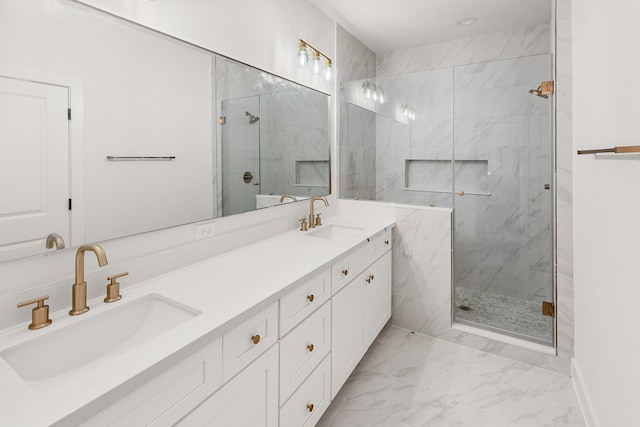 bathroom featuring vanity and a shower with shower door