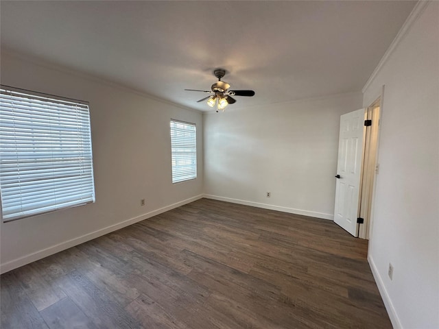6811 Roswell St, Houston, TX 77022 - spare room with crown molding, a ceiling fan, dark wood-style flooring, and baseboards