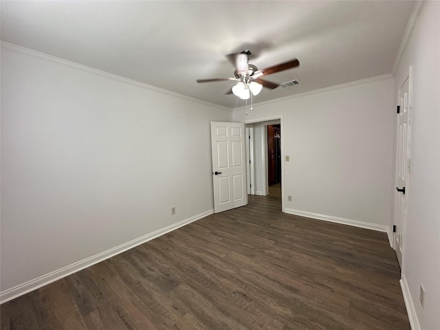 6811 Roswell St, Houston, TX 77022 - spare room with a ceiling fan, dark wood finished floors, crown molding, and baseboards