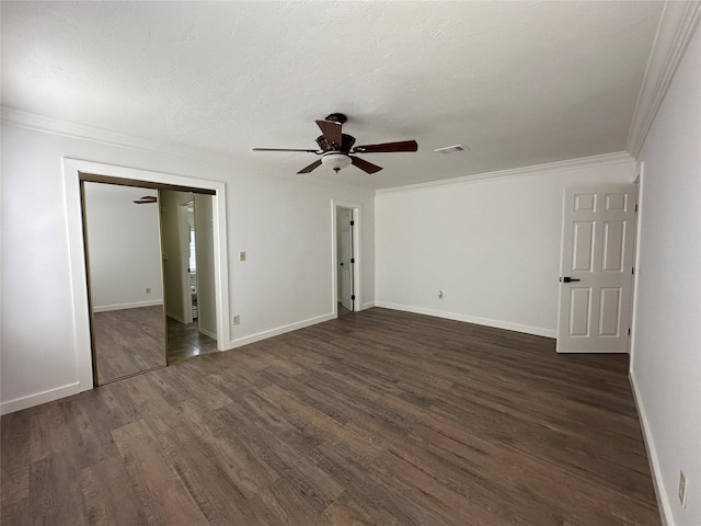 6811 Roswell St, Houston, TX 77022 - unfurnished bedroom featuring dark wood-type flooring, crown molding, baseboards, and a ceiling fan
