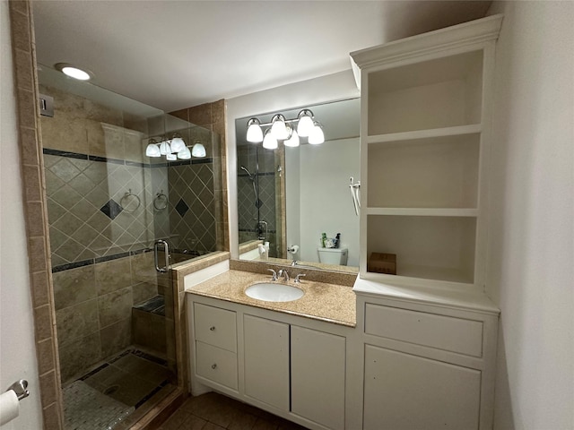 6811 Roswell St, Houston, TX 77022 - bathroom with a shower stall, vanity, and tile patterned flooring