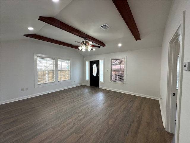 entrance foyer featuring dark hardwood / wood-style flooring, lofted ceiling with beams, and ceiling fan