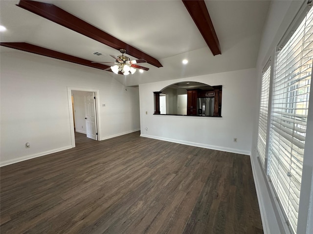 6811 Roswell St, Houston, TX 77022 - unfurnished living room featuring beamed ceiling, baseboards, dark wood-style floors, a ceiling fan, and recessed lighting
