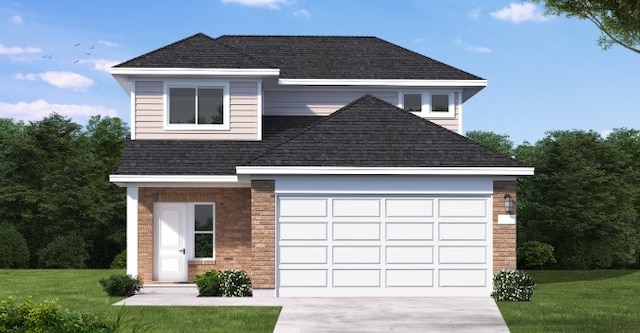 view of front of property with a front lawn and a garage