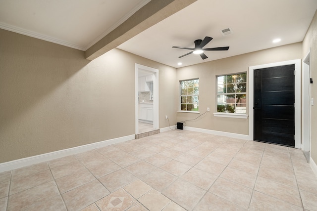 interior space featuring ceiling fan, crown molding, and light tile patterned floors