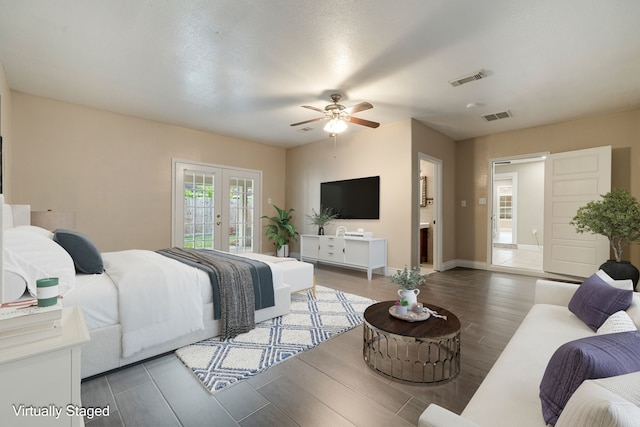 bedroom featuring access to exterior, ceiling fan, french doors, and dark wood-type flooring