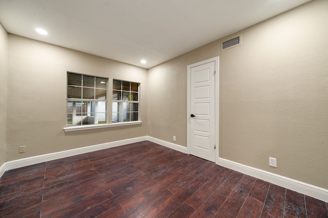 empty room with wood-type flooring