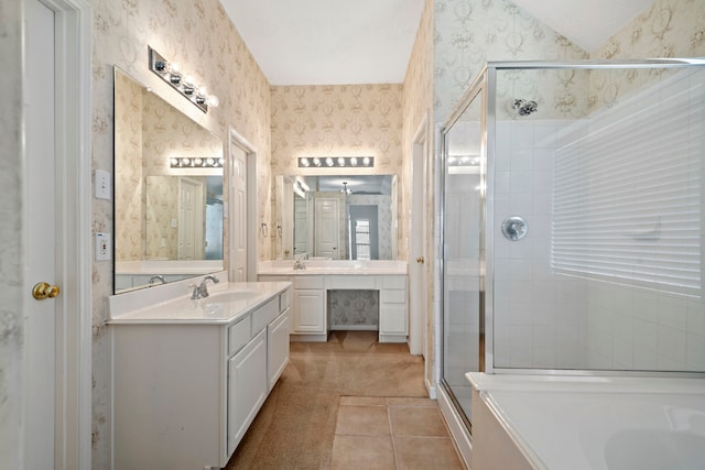 bathroom with tile patterned floors, vanity, and an enclosed shower