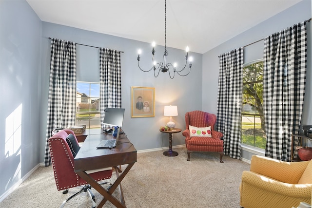 carpeted home office featuring a wealth of natural light and a notable chandelier