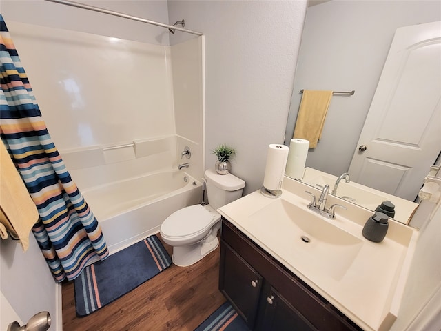 full bathroom featuring hardwood / wood-style flooring, vanity, toilet, and shower / tub combo with curtain