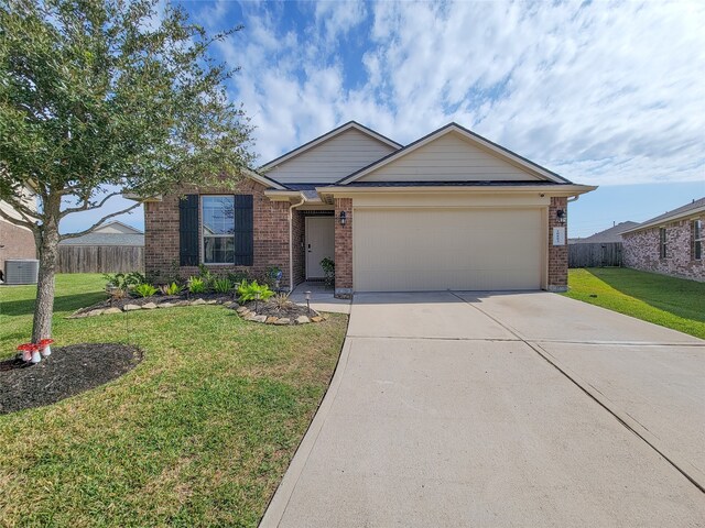 single story home featuring central air condition unit, a front lawn, and a garage