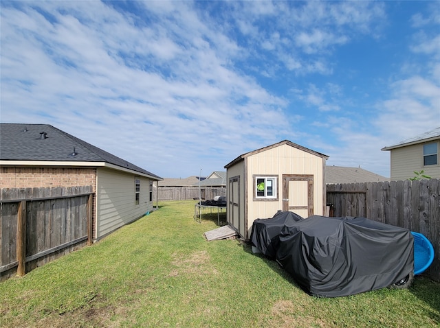 view of yard with a storage shed