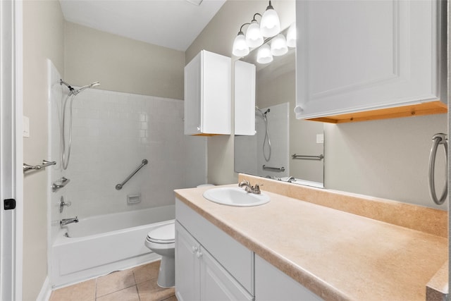 full bathroom with tiled shower / bath, tile patterned flooring, vanity, and toilet