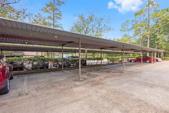 view of vehicle parking with a carport