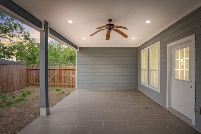 patio terrace at dusk with ceiling fan