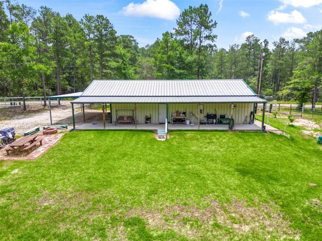 view of property's community featuring a yard