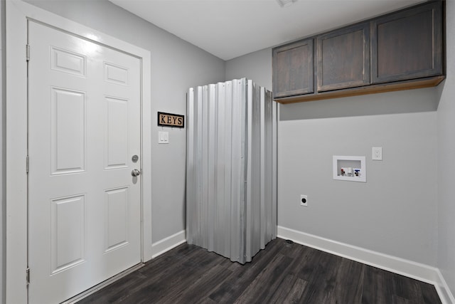 laundry room featuring hookup for an electric dryer, hookup for a washing machine, dark hardwood / wood-style floors, and cabinets