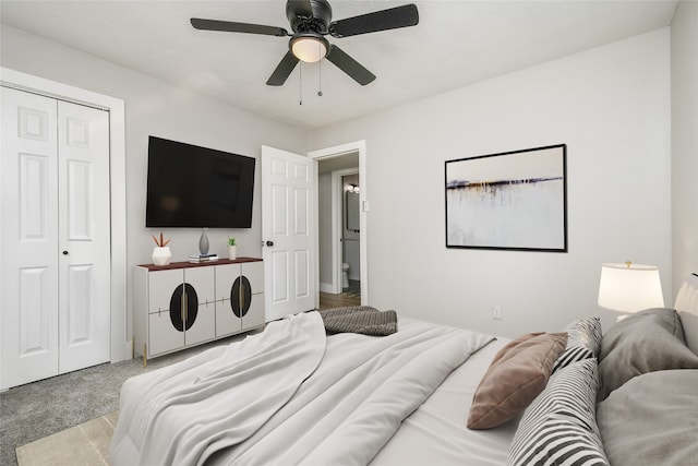 bedroom featuring ceiling fan and light carpet