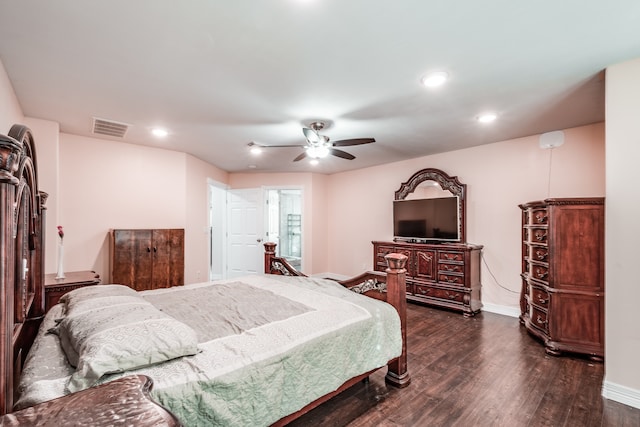 bedroom featuring dark hardwood / wood-style flooring and ceiling fan