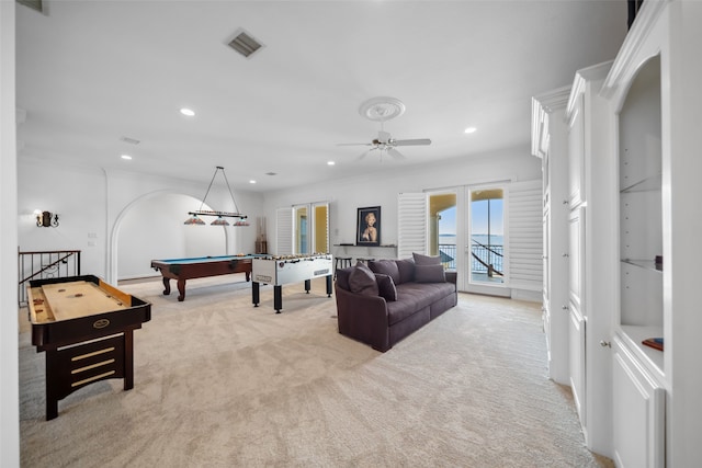 rec room with ceiling fan, light colored carpet, and pool table