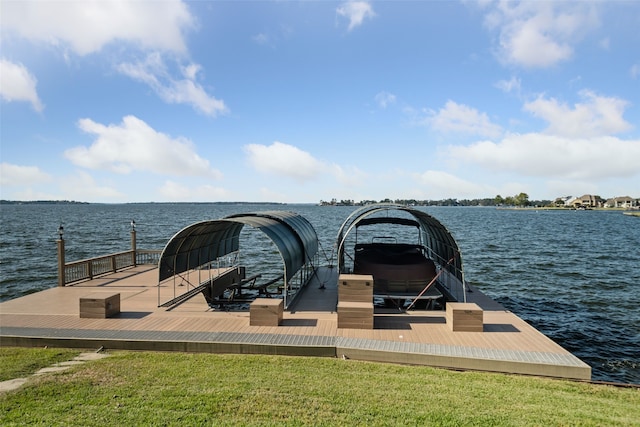 dock area with a water view