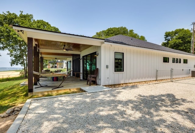 back of property featuring a patio and ceiling fan