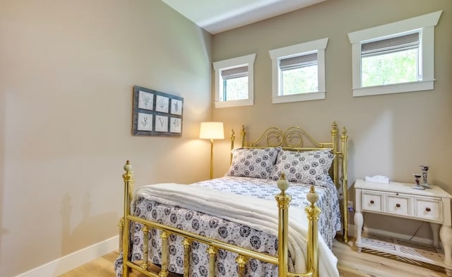 bedroom featuring light hardwood / wood-style floors