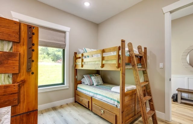 bedroom with light hardwood / wood-style flooring