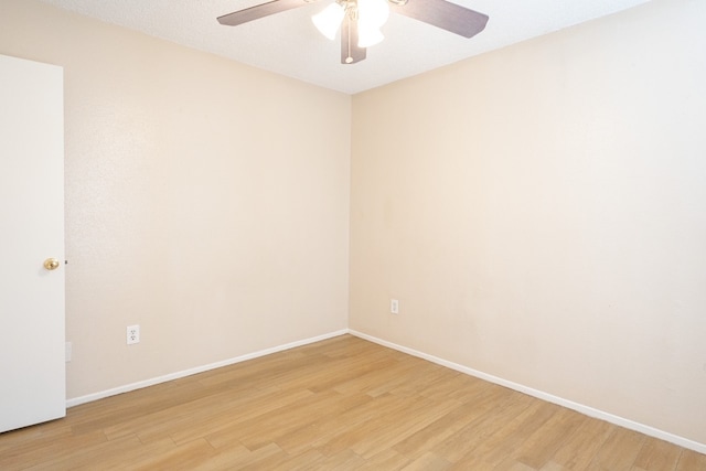 unfurnished room featuring light hardwood / wood-style floors and ceiling fan