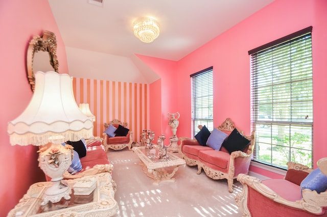 sitting room with a healthy amount of sunlight and carpet floors