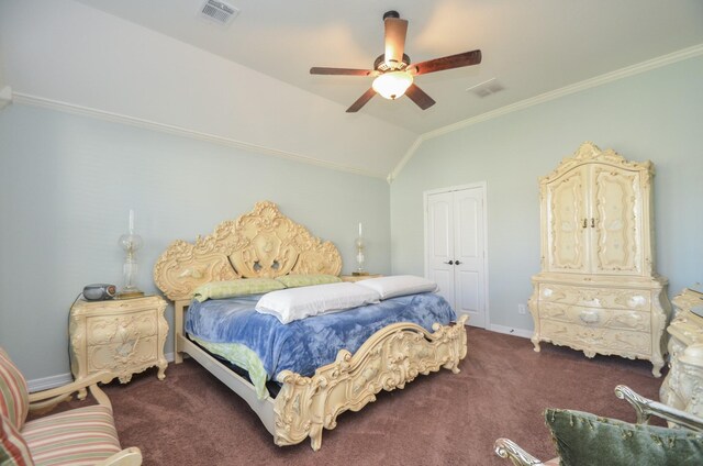 bedroom with ceiling fan, dark carpet, lofted ceiling, and ornamental molding