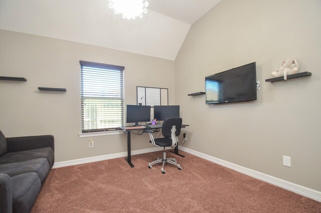 carpeted office space with vaulted ceiling