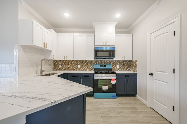 kitchen with white cabinetry, sink, and stainless steel gas range