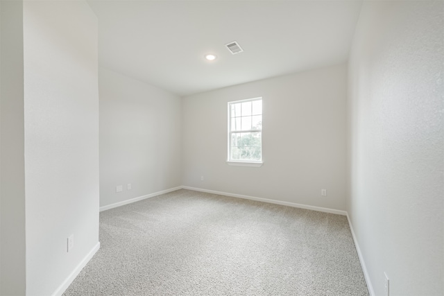 empty room featuring carpet flooring