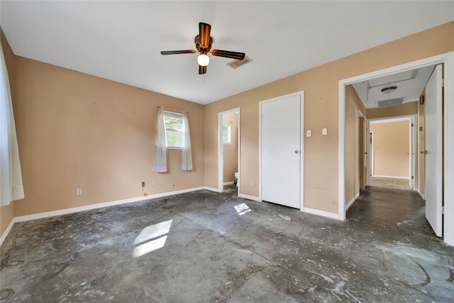 unfurnished bedroom featuring ceiling fan