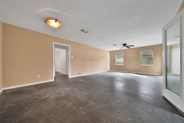 spare room with ceiling fan