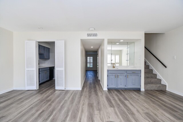 interior space featuring light hardwood / wood-style flooring and sink