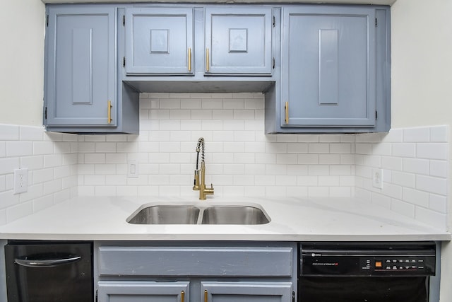 kitchen with backsplash, sink, and black dishwasher