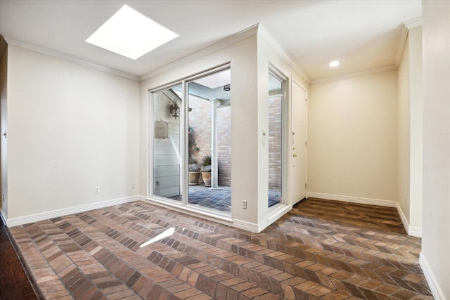 spare room with crown molding