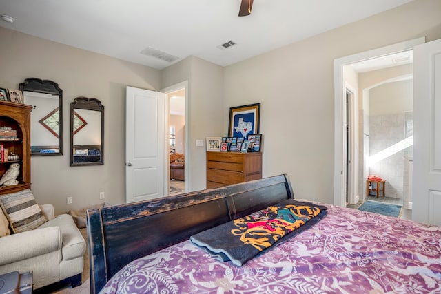 bedroom with ensuite bathroom and ceiling fan