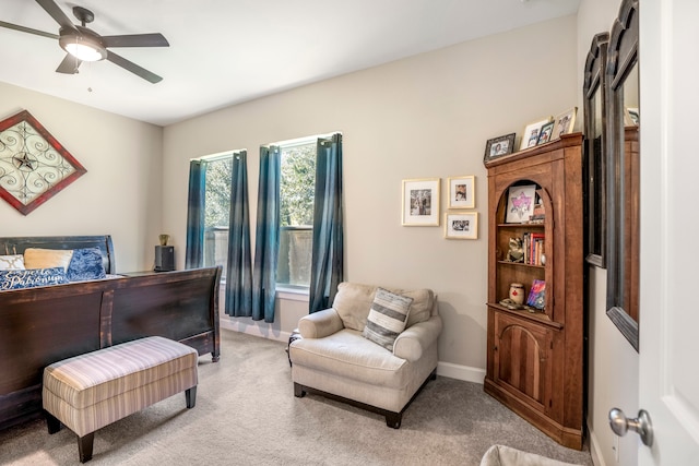 bedroom featuring ceiling fan and light colored carpet