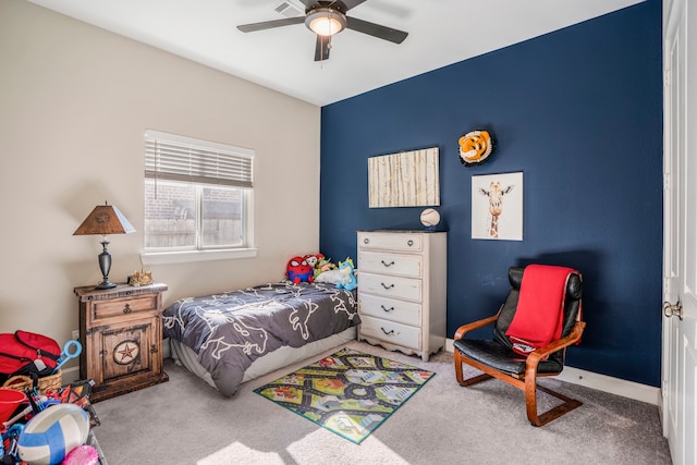 carpeted bedroom featuring ceiling fan