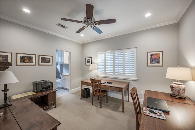 home office with ceiling fan, light colored carpet, and ornamental molding