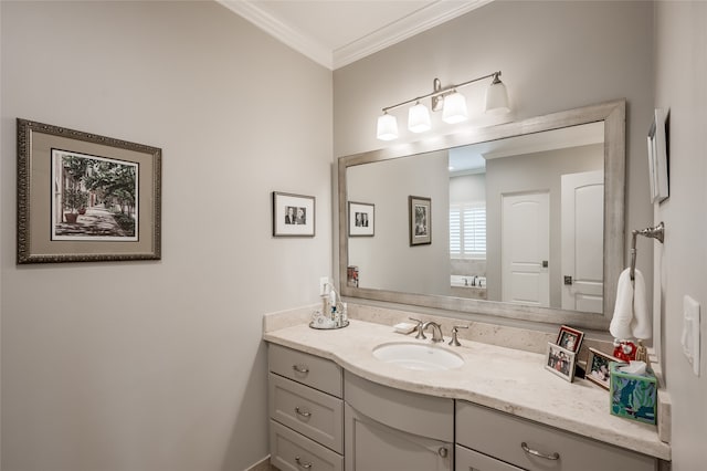 bathroom featuring vanity and crown molding