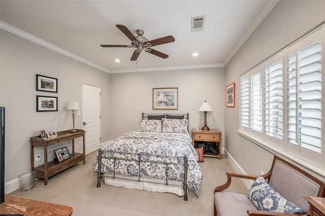 carpeted bedroom featuring ceiling fan and ornamental molding